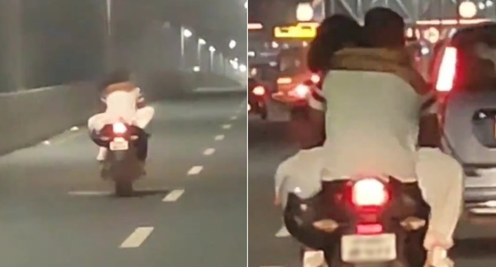 Casal é flagrado em momento íntimo com motocicleta em movimento em rua